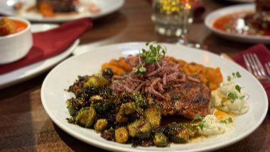 1853 Bistro & Bar Steak with Brussels Sprouts and garnish