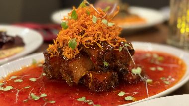 1853 Bistro & Bar Sticky Ribs with garnish