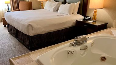 Hotel room bed and whirlpool tub