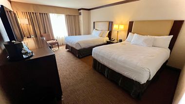 Hotel Room with two beds and a TV