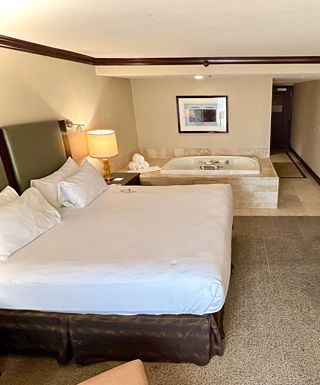 Hotel room bed and whirlpool tub