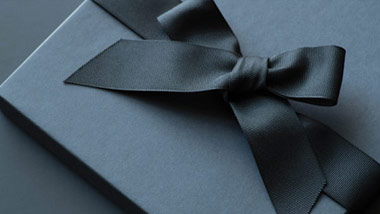 black gift box with ribbon